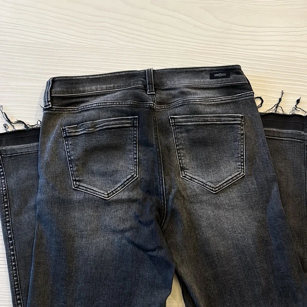 Distressed black Liverpool jean.